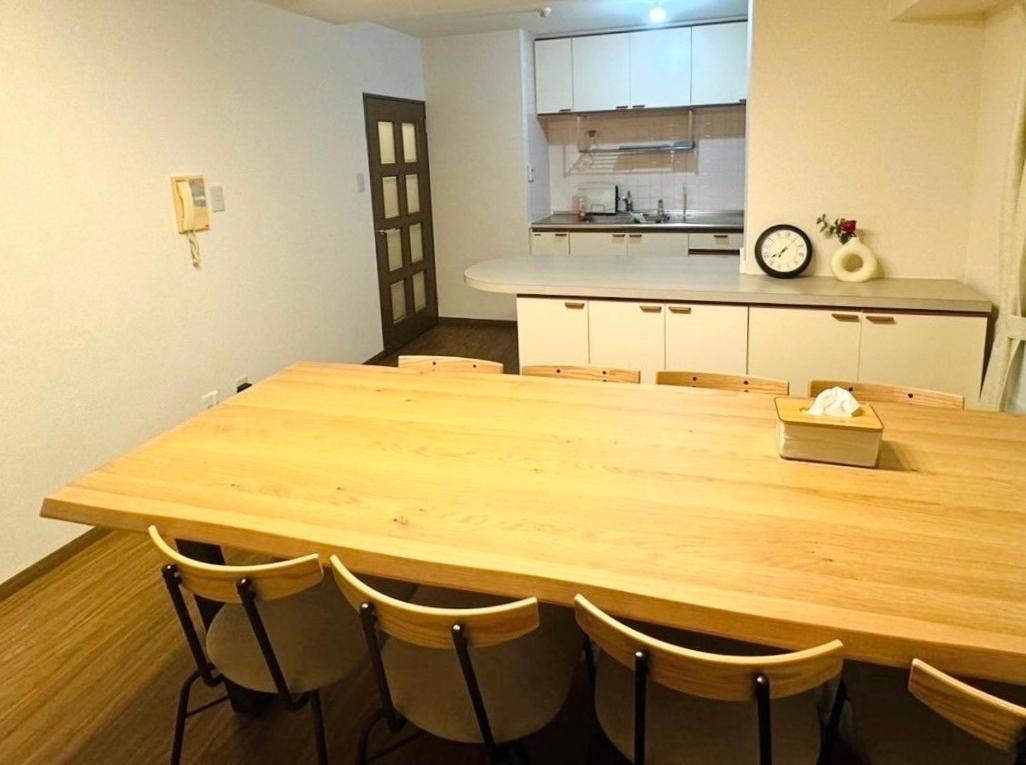 Tsubaki House Apartment *